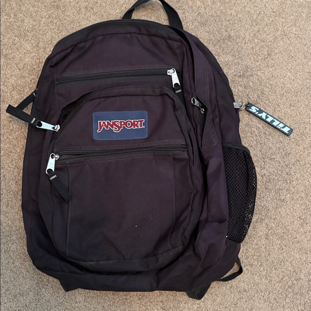 Jansport Dark Backpack with Multiple Pockets